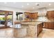 Gourmet kitchen featuring granite island and custom cabinetry at 6708 E Calle De Las Estrellas Rd, Cave Creek, AZ 85331