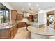 Spacious kitchen with granite countertops, custom cabinetry and stainless steel appliances at 6708 E Calle De Las Estrellas Rd, Cave Creek, AZ 85331