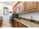 Bright laundry room with ample storage and countertop space at 6708 E Calle De Las Estrellas Rd, Cave Creek, AZ 85331