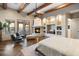 Main bedroom with wood beams, built-ins and fireplace at 6708 E Calle De Las Estrellas Rd, Cave Creek, AZ 85331