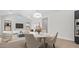 Bright dining area with view of kitchen and living room at 699 E Greenback Dr, San Tan Valley, AZ 85140