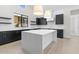 Modern kitchen with white countertops and dark cabinetry at 699 E Greenback Dr, San Tan Valley, AZ 85140