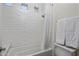 Clean bathroom with subway tile, shower/tub combo, and white vanity at 7040 N 1St Ave, Phoenix, AZ 85021