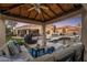 Covered patio with comfortable seating and pool view at 7040 N 1St Ave, Phoenix, AZ 85021