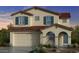 Two-story house with terracotta roof and teal door at 7833 E Raleigh Ave, Mesa, AZ 85212