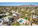 Aerial view of community pool and surrounding houses at 8018 N 3Rd Pl, Phoenix, AZ 85020