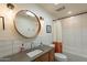 Modern bathroom with a stylish vanity, bathtub, and updated fixtures at 8018 N 3Rd Pl, Phoenix, AZ 85020