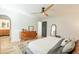 Bright bedroom with a king-size bed and mid-century modern dresser at 8018 N 3Rd Pl, Phoenix, AZ 85020