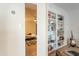 Built-in bookshelves and view into bedroom beyond at 8018 N 3Rd Pl, Phoenix, AZ 85020