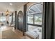 Bright entryway with arched windows and wooden benches at 8018 N 3Rd Pl, Phoenix, AZ 85020