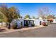 White stucco house with arched entryway and landscaping at 8018 N 3Rd Pl, Phoenix, AZ 85020