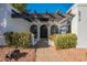 Modern front entry with pergola and drought-tolerant landscaping at 8018 N 3Rd Pl, Phoenix, AZ 85020