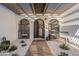 Front entry with pergola, pathway, and succulents at 8018 N 3Rd Pl, Phoenix, AZ 85020