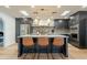 Stylish kitchen featuring dark cabinetry and a large island at 8018 N 3Rd Pl, Phoenix, AZ 85020