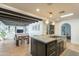 Open concept kitchen with an island, dining area and modern appliances at 8018 N 3Rd Pl, Phoenix, AZ 85020