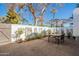 Private patio with outdoor dining set and umbrella at 8018 N 3Rd Pl, Phoenix, AZ 85020