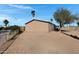 Spacious backyard with a view of the home's exterior at 8155 E Baltimore St, Mesa, AZ 85207