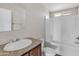 Clean bathroom with a bathtub and vanity at 8155 E Baltimore St, Mesa, AZ 85207