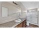 Bathroom with a shower and modern vanity at 8155 E Baltimore St, Mesa, AZ 85207