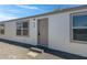 Home featuring a neutral colored front door, neutral exterior paint and desert landscaping at 8155 E Baltimore St, Mesa, AZ 85207