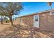 Exterior view showcasing the back of the house and a side yard at 8155 E Baltimore St, Mesa, AZ 85207