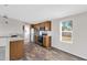 Modern kitchen with granite counters and stainless steel appliances at 8155 E Baltimore St, Mesa, AZ 85207