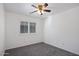 Bedroom with window shutters and carpet at 9036 E Halifax Cir, Mesa, AZ 85207