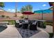 Stunning outdoor kitchen and dining area, perfect for entertaining at 9036 E Halifax Cir, Mesa, AZ 85207