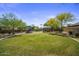 Community playground with shaded seating area at 9036 E Halifax Cir, Mesa, AZ 85207