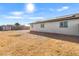 Backyard with gravel ground, shed, and fence at 9163 W Swansea Dr, Arizona City, AZ 85123