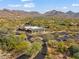 Aerial view of Desert Camp community with mountain views at 9280 E Thompson Peak Pkwy # 15, Scottsdale, AZ 85255