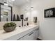 Modern bathroom with floating vanity, sleek fixtures, and large mirror at 9280 E Thompson Peak Pkwy # 15, Scottsdale, AZ 85255