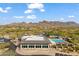 Community center with pool and mountain backdrop at 9280 E Thompson Peak Pkwy # 15, Scottsdale, AZ 85255