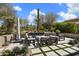 Private backyard patio with seating area and desert landscaping at 9280 E Thompson Peak Pkwy # 15, Scottsdale, AZ 85255