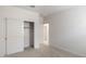 Bright bedroom closet with sliding doors and shelving at 9514 N 178Th Dr, Waddell, AZ 85355