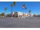 Large community building with ample parking at 9746 N 105Th Dr, Sun City, AZ 85351