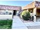 Landscaped front yard with walkway leading to the entrance at 9746 N 105Th Dr, Sun City, AZ 85351