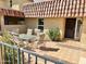 Inviting patio with dining set perfect for enjoying outdoor meals and relaxation at 9746 N 105Th Dr, Sun City, AZ 85351