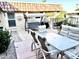 Relaxing patio with seating area and a swing at 9746 N 105Th Dr, Sun City, AZ 85351