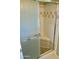 Shower stall with tiled walls and built-in seat at 9746 N 105Th Dr, Sun City, AZ 85351