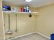 Functional storage room with shelving, providing ample space for organization, and neutral colored paint at 9746 N 105Th Dr, Sun City, AZ 85351