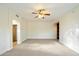 Bedroom with ceiling fan and access to hallway closet at 9926 E Hidden Green Dr, Scottsdale, AZ 85262