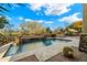 Resort style pool with fire pit and expansive patio at 9926 E Hidden Green Dr, Scottsdale, AZ 85262