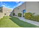 Turf backyard with basketball hoop and desert landscaping at 10040 E Happy Valley Rd # 297, Scottsdale, AZ 85255