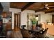 Small dining area with a round table and four chairs, adjacent to a kitchen at 10040 E Happy Valley Rd # 297, Scottsdale, AZ 85255