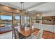 Dining room with a view of the pool area provides a wonderful place for enjoying indoor/outdoor gatherings at 10040 E Happy Valley Rd # 297, Scottsdale, AZ 85255