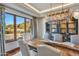 Dining room features a chandelier, scenic views through windows, and seating for memorable gatherings at 10040 E Happy Valley Rd # 297, Scottsdale, AZ 85255