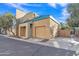 Two-story townhome with attached garage and desert landscaping at 1015 S Val Vista Dr # 87, Mesa, AZ 85204