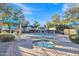 Community pool and spa area with lounge chairs and shaded seating at 1015 S Val Vista Dr # 87, Mesa, AZ 85204