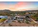 Stunning aerial view of a home with a pool and desert landscape at 103 W Tanya Rd, Phoenix, AZ 85086